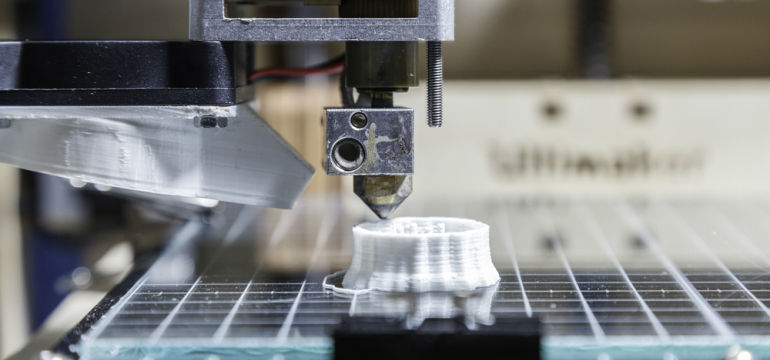 3D Printer Producing A Three Dimensional Model